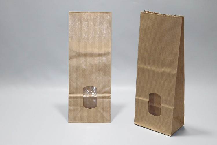 Blokbodemzakken Kraft Bruin 10,5x6,5x27,5cm 70 g/m² gevoerd met 30my OPP Folie en helder Venster | 500 gram (100 stuks) [PAB1015]