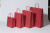 Draagtassen Papier Rood 18+8x22cm Kraft Papier 90 grams (50 stuks) [PAM1822R]